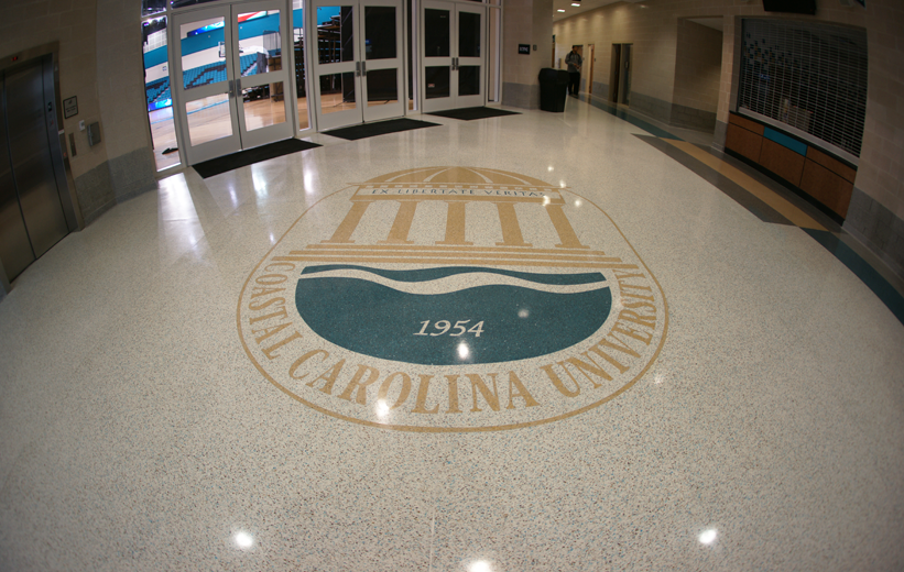 Coastal Carolina University logo in terrazzo inside the student athletic center