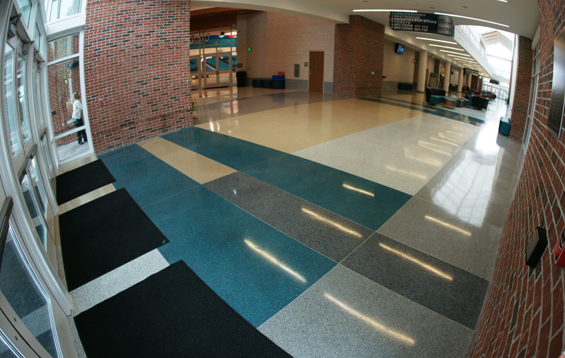 Green gray and yellow epoxy terrazzo flooring at the entrance of Coastal Carolina University athletic center