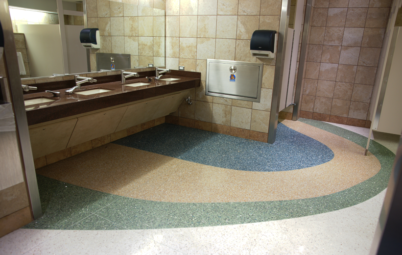 Epoxy terrazzo flooring installed inside airport bathroom