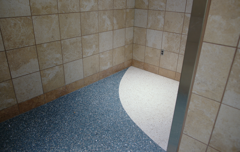 terrazzo bathroom flooring at Northwest Arkansas Regional Airport