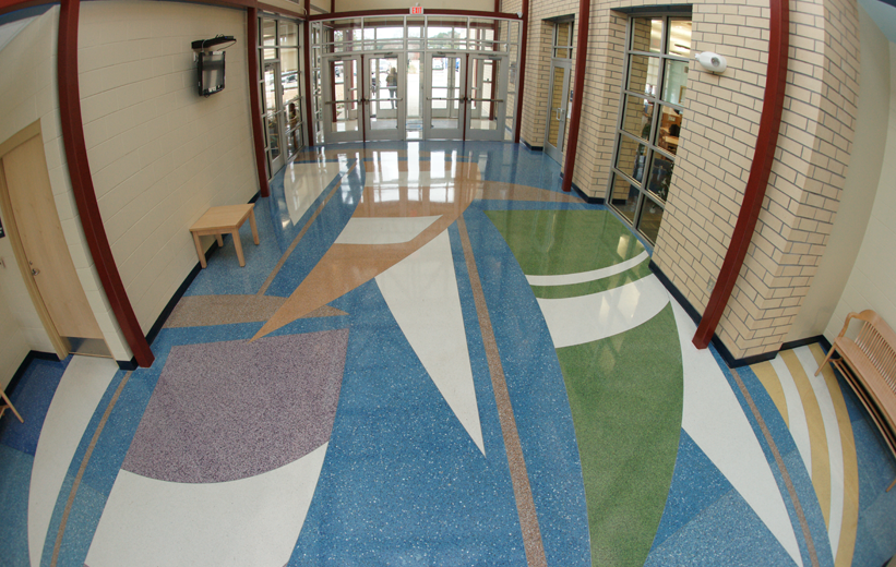 Blue Epoxy Terrazzo flooring with sailboat designs at Oakland Elementary School
